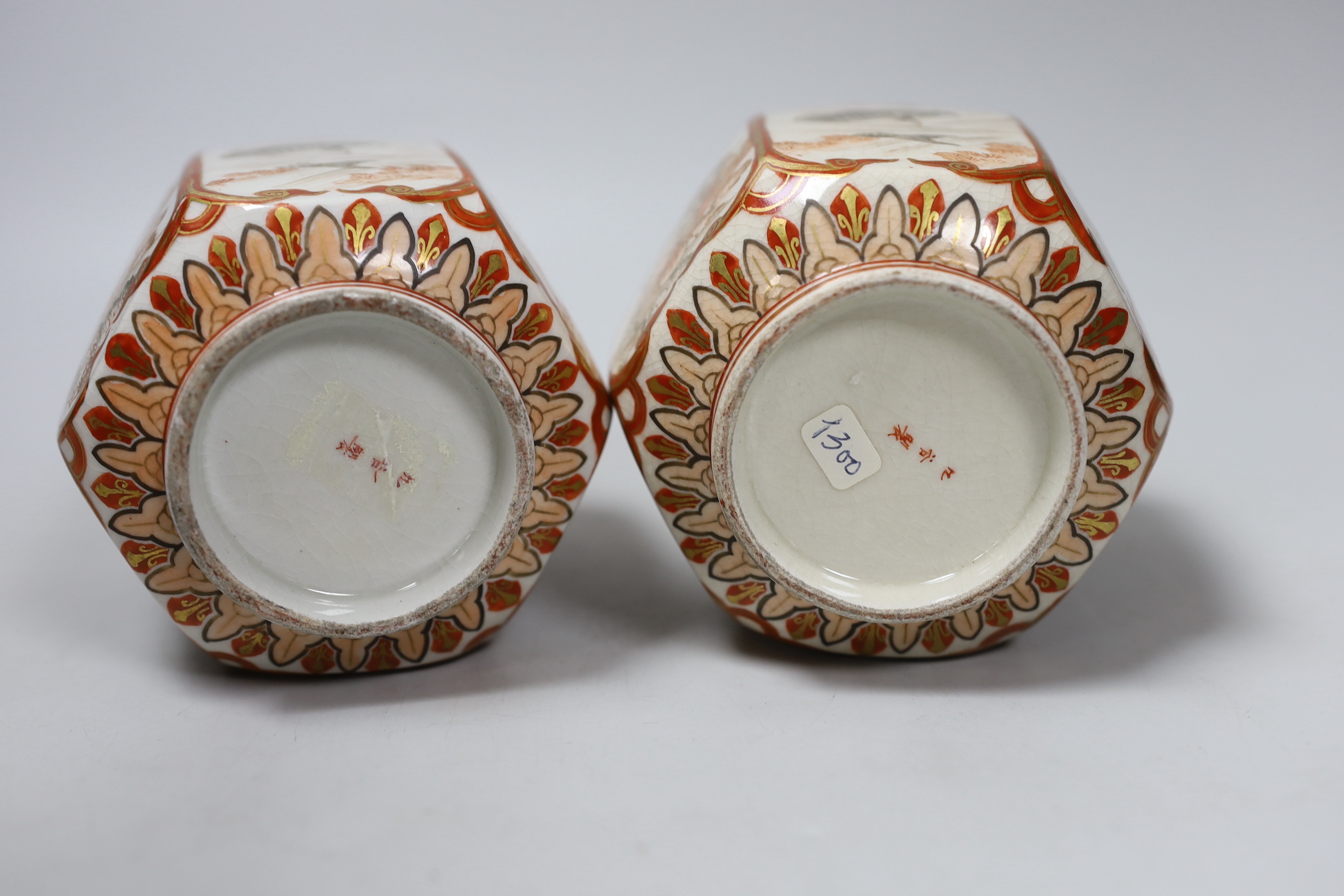 A pair of Meiji period Kutani hexagonal jars and covers, with inner and outer covers, 14cm high